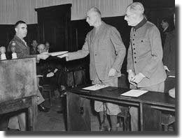 Wilhelm List is handed the indictment in the Hostage Trial in 1947