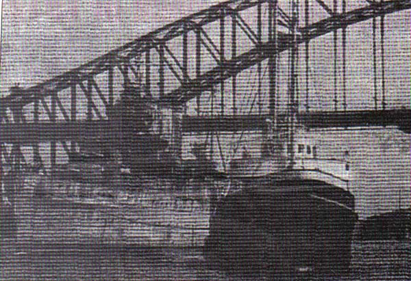 HMAS Shropshire about to start her long tow to the Ship Breakers, by the Dutch Tug, Oostzee, leaving Sydney on the 9th. of October 1954 arriving in the Clyde Scotland, on the 20th. of January 1955. A sad sight for all her former crew members.