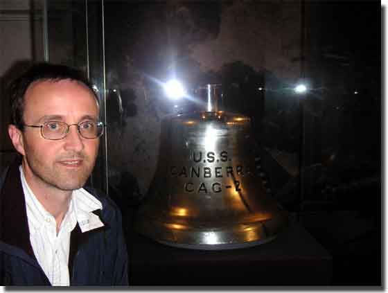 Raymond Edwin Gregory with the Bell on display in the American Gallery, at the Australian National Maritime Museum at Darling Harbour Sydney.