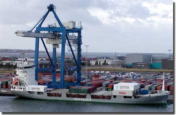 A "FEEDER" container ship loading at Copenhagen Denmark.