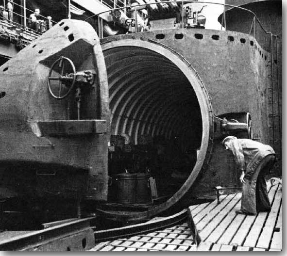 The huge hangar door open on the deck of an I-400 class Japanese Submarine, probably this is I-401.
