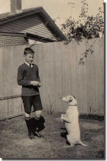 Me with my fox terrier BOB, about 1935, having just sat for the Naval College entrance examination. 