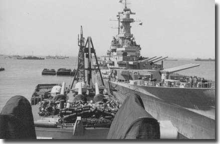 USS Missouri  Unloading her 16 inch ammunition, with USS Denver alongside, December, 1945