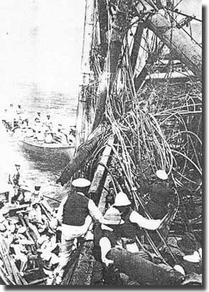 Australian seamen aboard the wreck of Seedler, at Mopelia Island