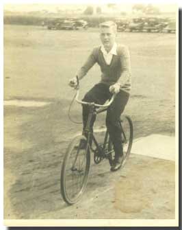 Young Mac on a bike