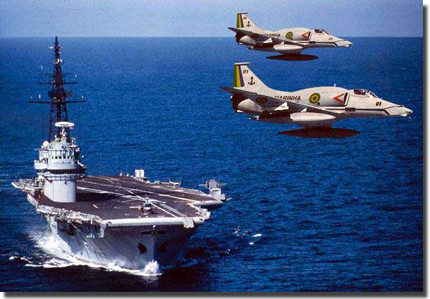 Vengeance as the Brazilian Navy Minas Gerais, refitted with an angle deck, in 2000.  A4 Skyhawks fly close by.