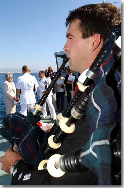 Major Hamish Denham from the Cyprus Military Working Dog Support Unit, plays his bagpipes