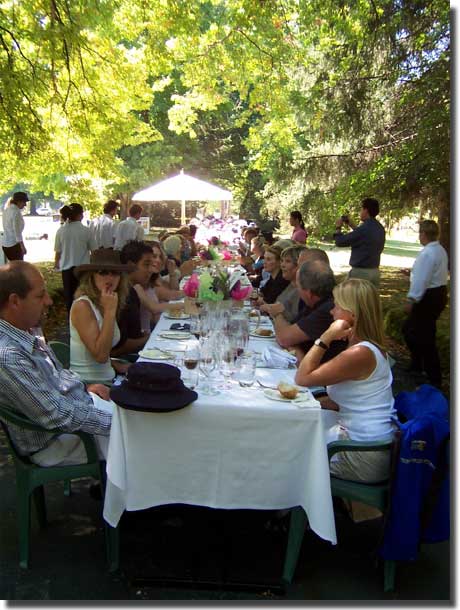 The long lunch table and some of the participants